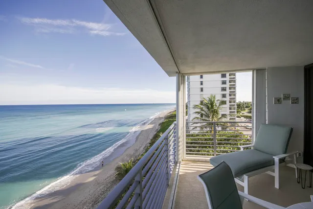 a view of a living room and dining room with furniture