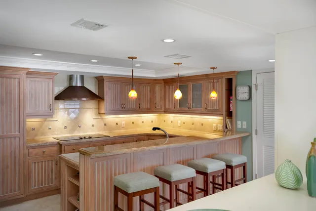 a kitchen with a sink and a stove