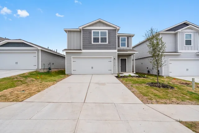 a view of a house with a swimming pool
