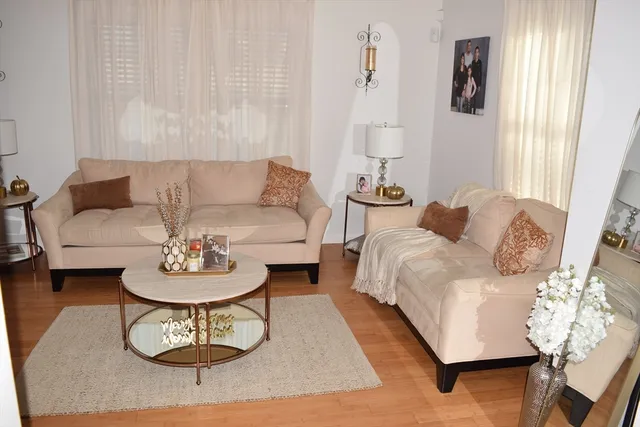 a living room with furniture and a couch