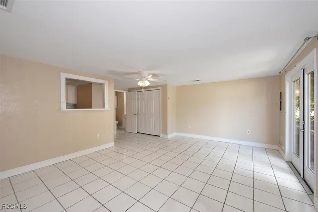 a view of an empty room with window