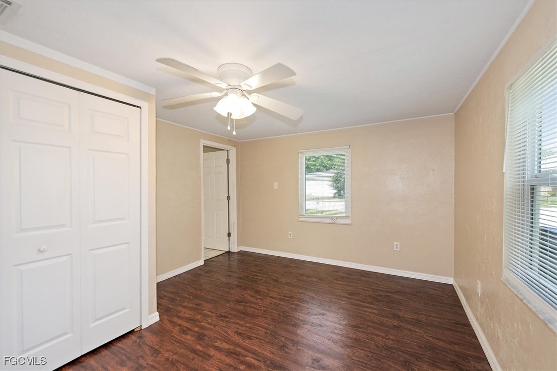 1905 Oakley Avenue, Unit A AND B Fort Myers, FL 33901 - Photo 23 of 30 a view of empty room with wooden floor and fan