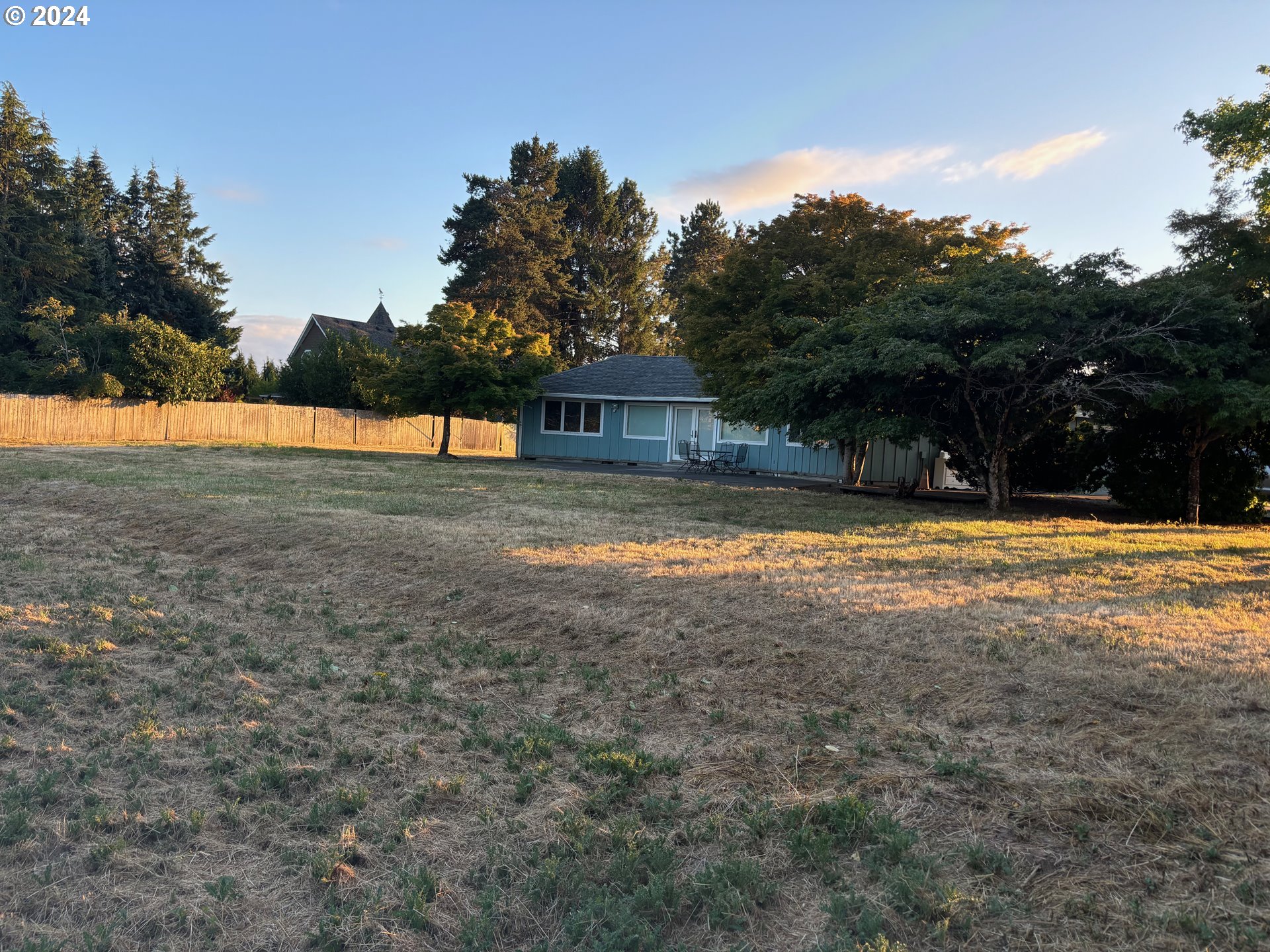 15485 Southeast Bartel Road Boring, OR 97009 - Photo 2 of 16 a view of swimming pool with an outdoor space and seating area