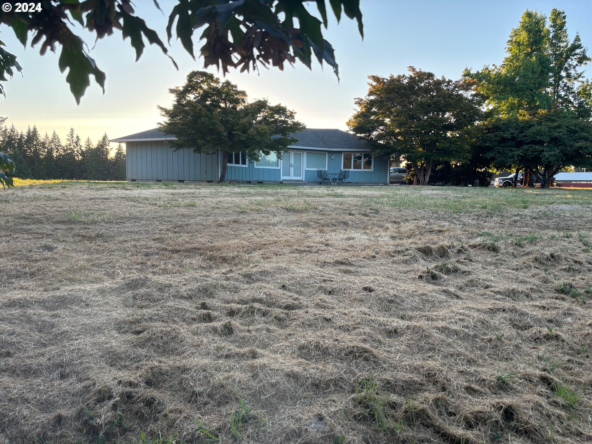 15485 Southeast Bartel Road Boring, OR 97009 - Photo 3 of 16 a front view of a house with a yard