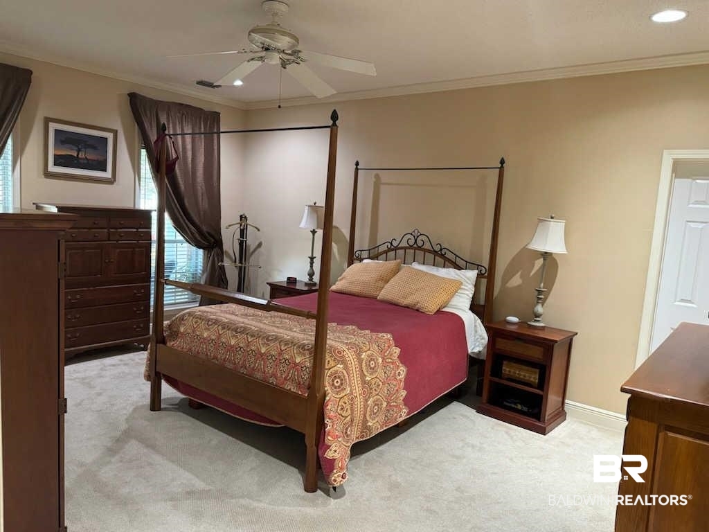 31163 Woodland Way Daphne, AL 36527 - Photo 12 of 44 Carpeted bedroom featuring ceiling fan and ornamental molding