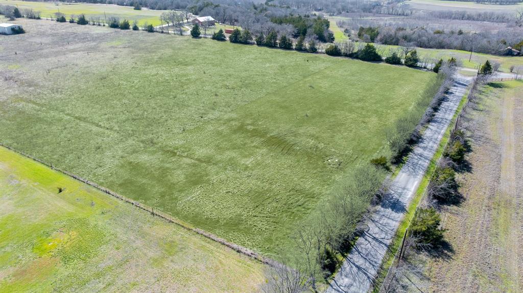Tbd Lot 2 Tbd Road Whitewright, TX 75491 - Photo 4 of 5 a view of a big yard with potted plants