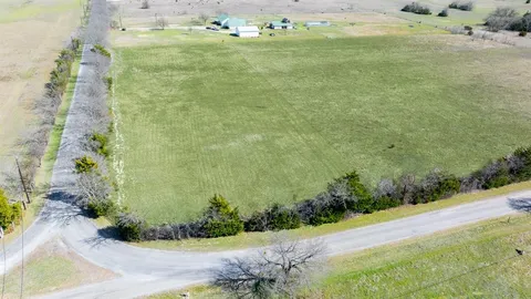 a view of a yard with an outdoor space