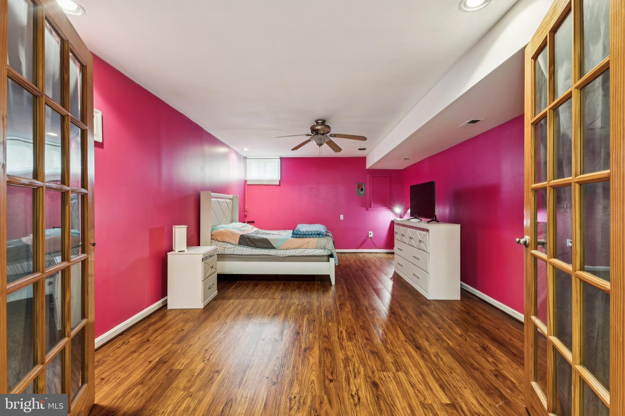 8305 Joan Place Clinton, MD 20735 - Photo 26 of 40 a bedroom with furniture and a bed