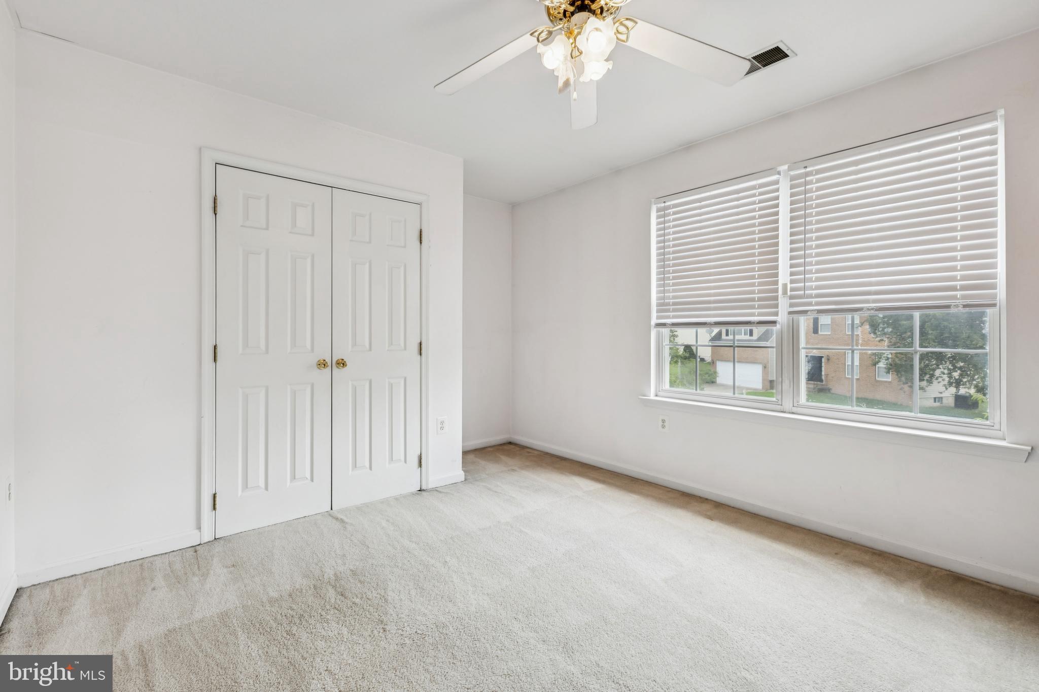 8305 Joan Place Clinton, MD 20735 - Photo 30 of 40 a view of an empty room with a window