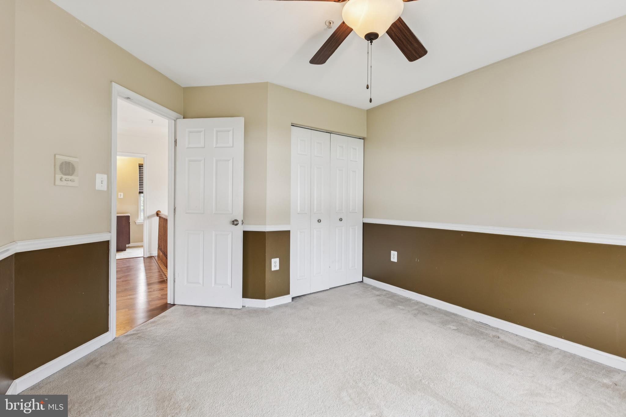 8305 Joan Place Clinton, MD 20735 - Photo 33 of 40 an empty room with closet and windows