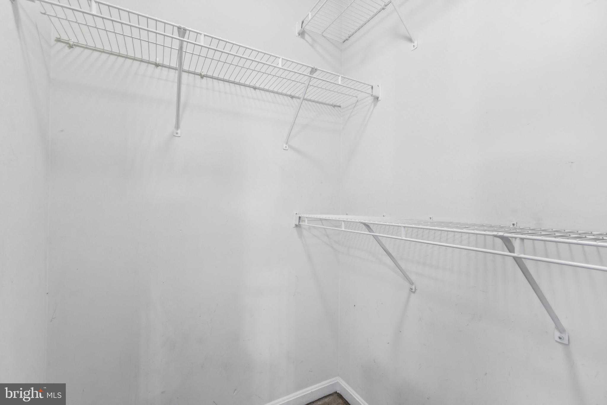 8305 Joan Place Clinton, MD 20735 - Photo 34 of 40 a view of a room with racks on the wall