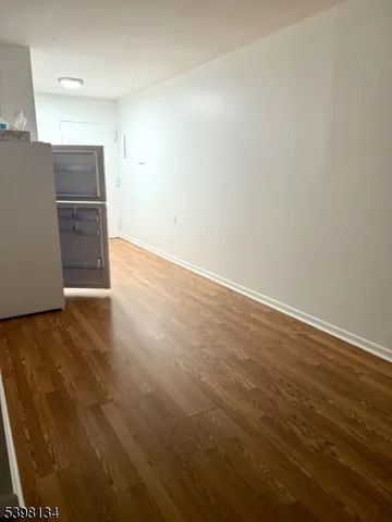 a view of a kitchen with a sink