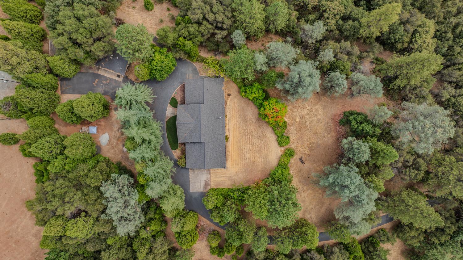 19491 East Clinton Road Jackson, CA 95642 - Photo 15 of 72 an aerial view of a house with a yard