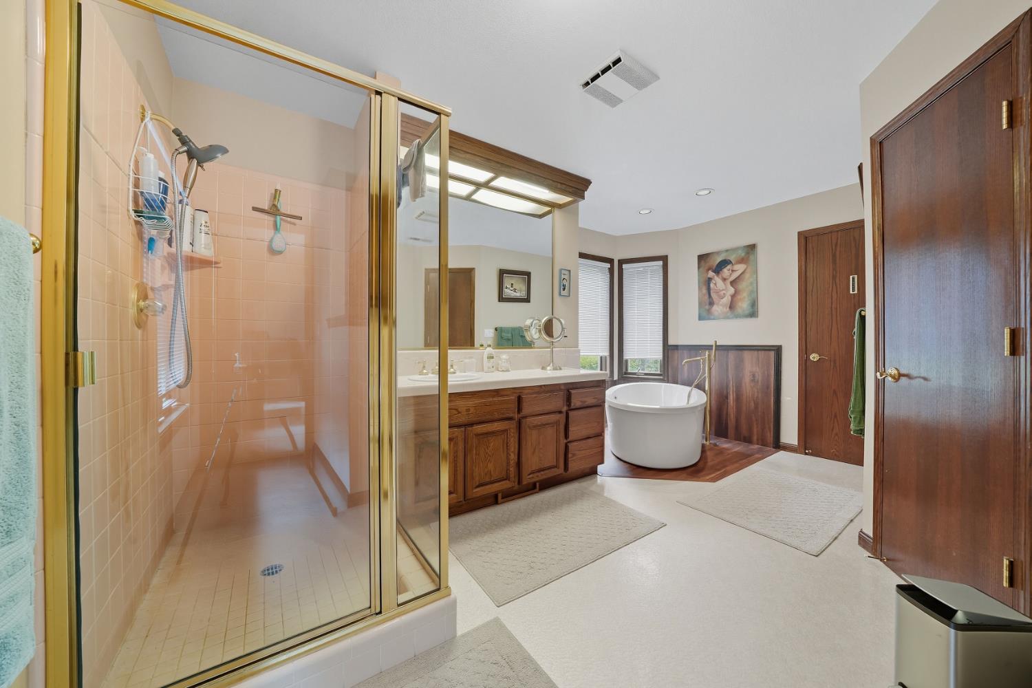 19491 East Clinton Road Jackson, CA 95642 - Photo 40 of 72 a bathroom with a shower sink and mirror