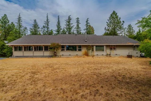 a view of a house with a street