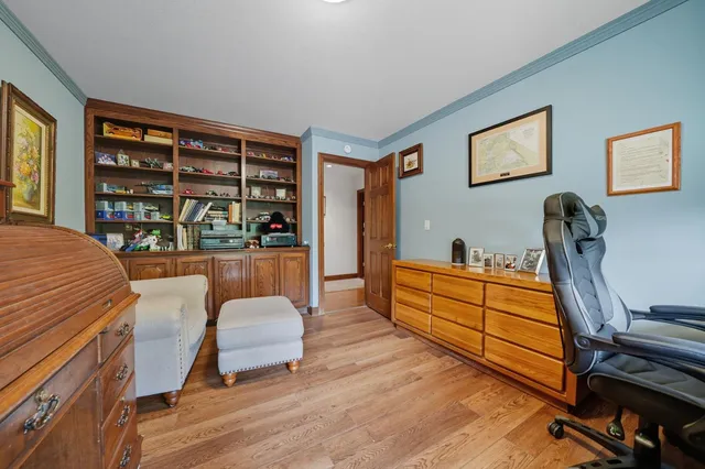 a bathroom with a bathtub and a window
