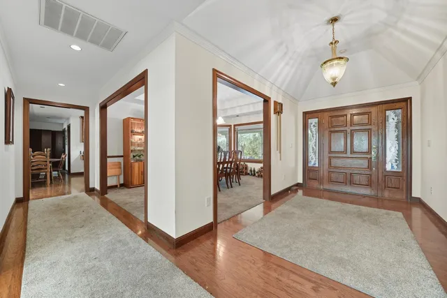 a view of a chairs and table in the patio