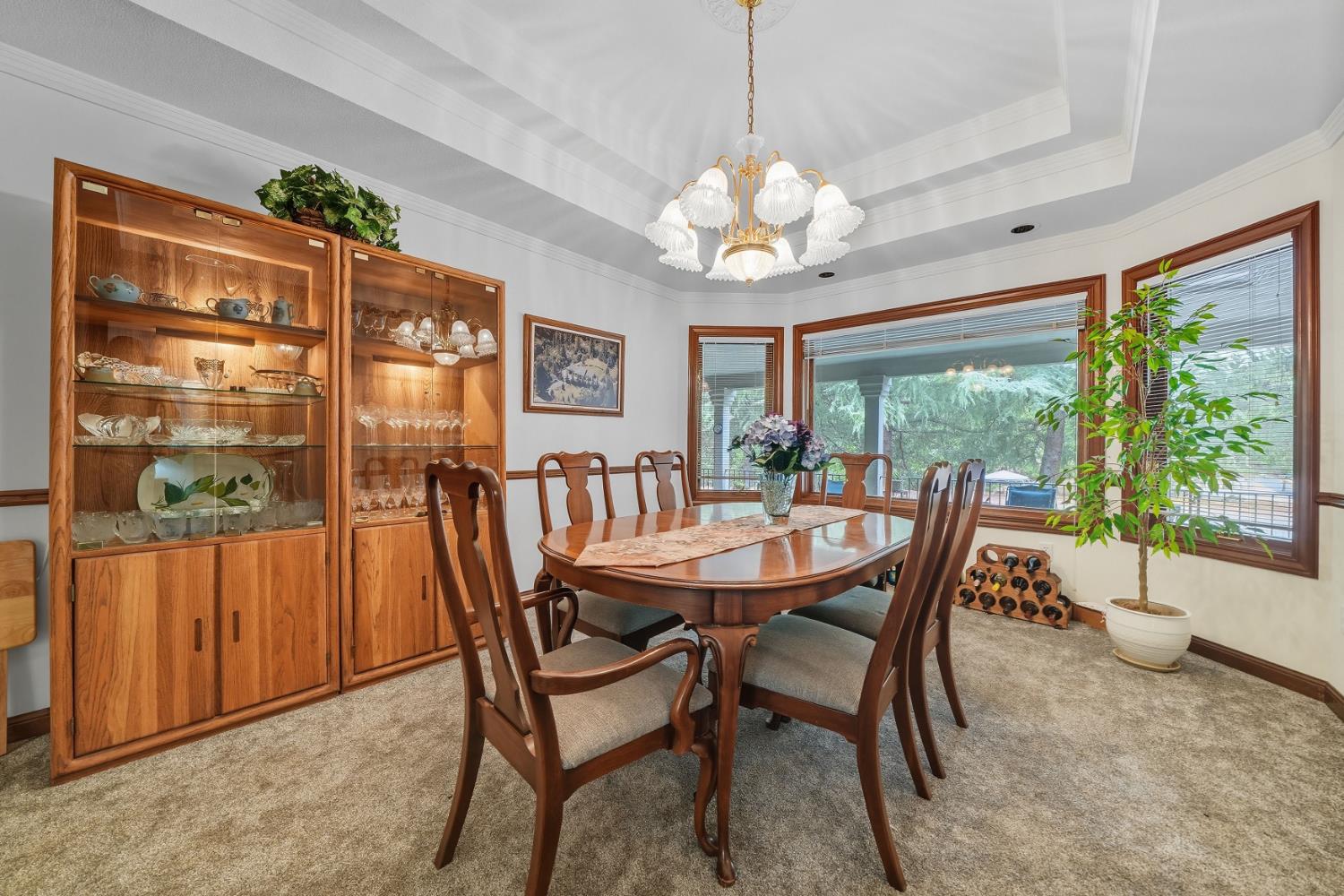 19491 East Clinton Road Jackson, CA 95642 - Photo 57 of 72 a view of a dining room with furniture wooden floor and chandelier
