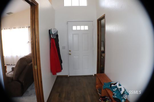 425 Veada Avenue Ridgecrest, CA 93555 - Photo 8 of 35 a view of walk in closet with clothes and shoes