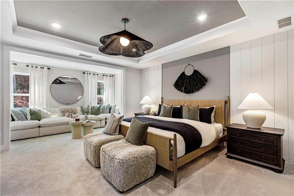 239 Rockledge Bend Powder Springs, GA 30127 - Photo 14 of 14 a living room with furniture a large window and a flat screen tv