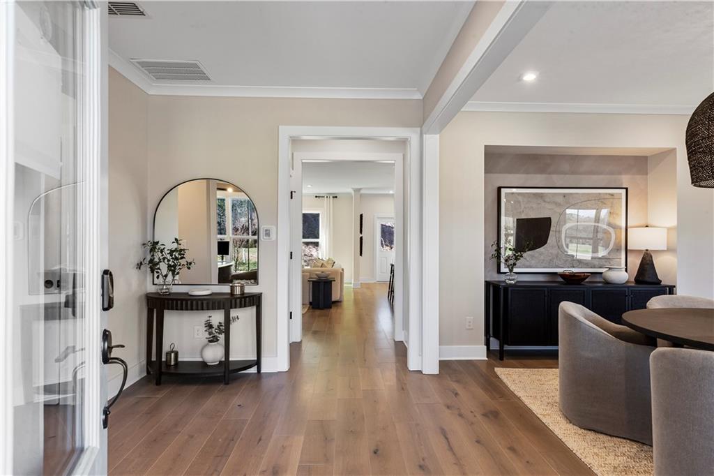 239 Rockledge Bend Powder Springs, GA 30127 - Photo 2 of 14 a living room with furniture and wooden floor