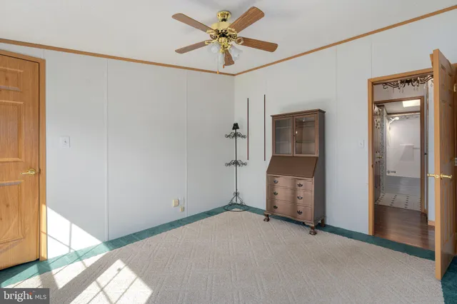 a view of empty room with windows