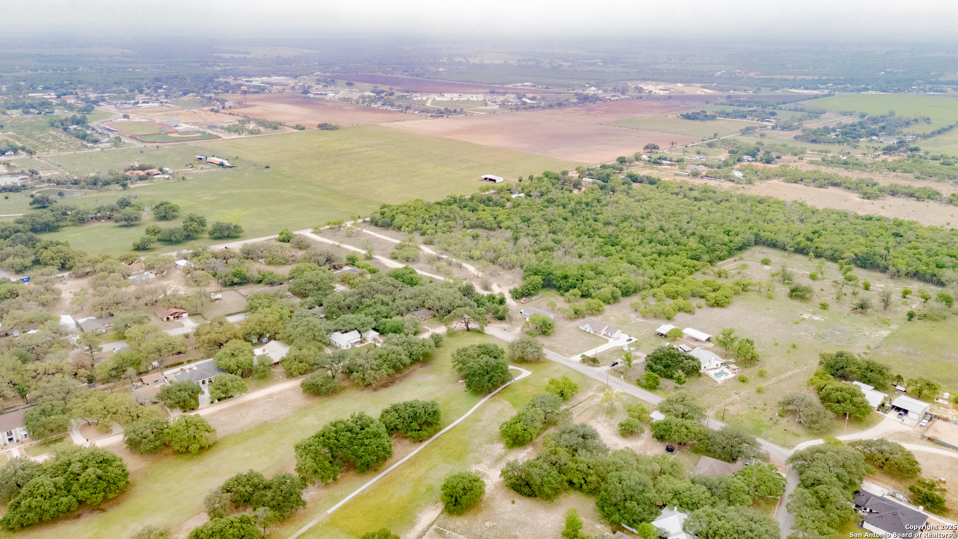769 County Road 769 Devine, TX 78016 - Photo 7 of 10 a view of a city with mountains in the background