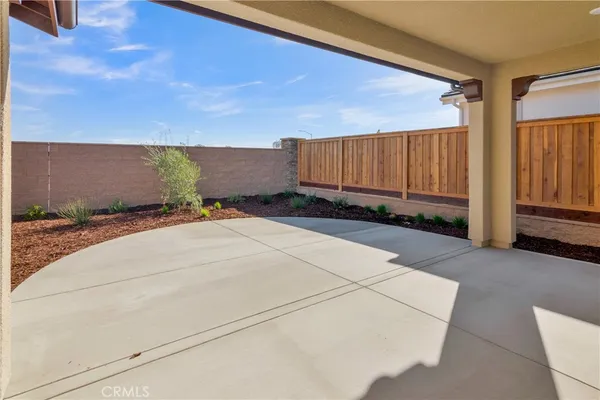 a view of a backyard of a house