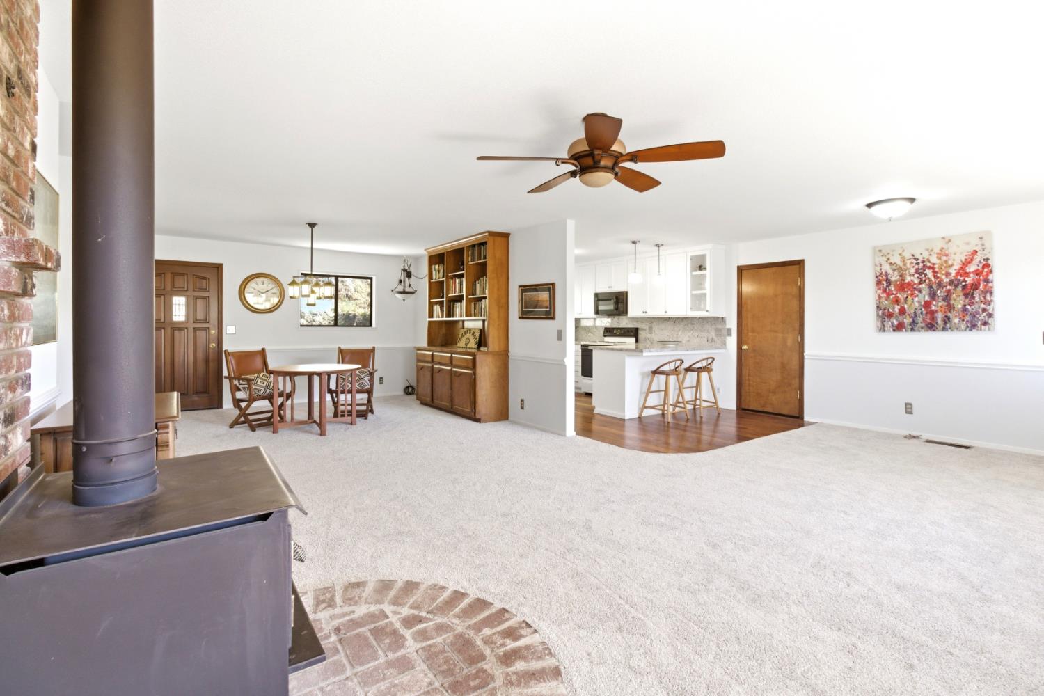 6060 Terras Path Placerville, CA 95667 - Photo 16 of 40 Living Room Showing Dining Room And Kitchen