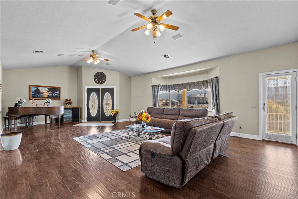 40647 Shallow Springs Road Leona Valley, CA 93551 - Photo 11 of 41 a living room with furniture and a wooden floor