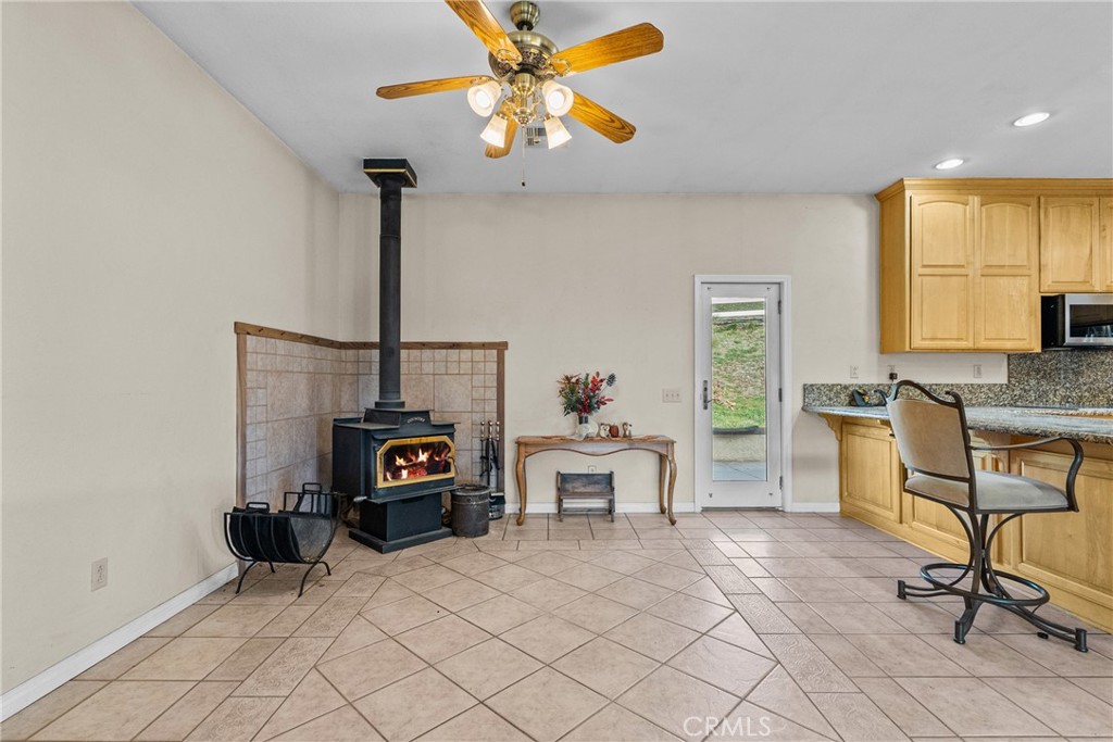 40647 Shallow Springs Road Leona Valley, CA 93551 - Photo 16 of 41 a bedroom with a bed and a chandelier