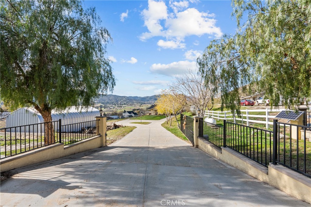 40647 Shallow Springs Road Leona Valley, CA 93551 - Photo 2 of 41 a view of a swimming pool with a yard