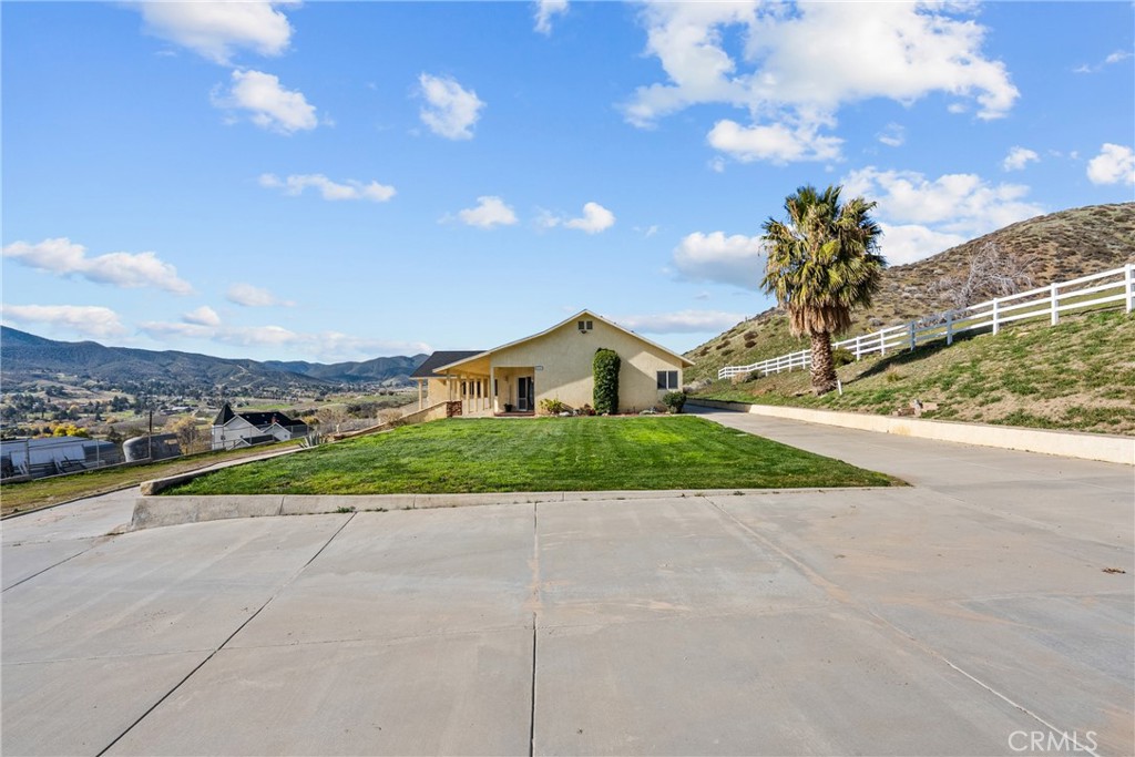 40647 Shallow Springs Road Leona Valley, CA 93551 - Photo 6 of 41 a view of a street with a houses
