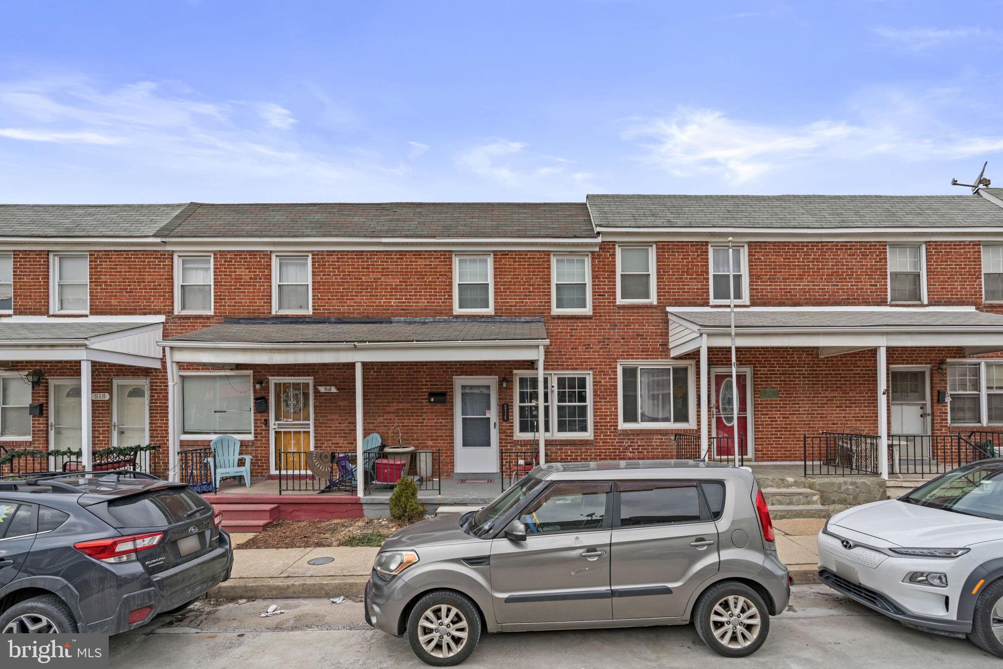 514 Umbra Street Baltimore, MD 21224 - Photo 1 of 37 front view of a house with car parked