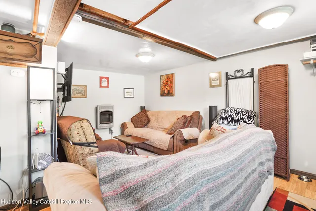 a bed room with two bed and a couch