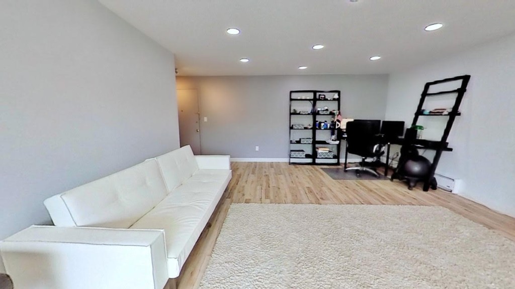 1206 Greendale Avenue, Unit 201 Needham, MA 02492 - Photo 11 of 26 a living room with furniture and a wooden floor