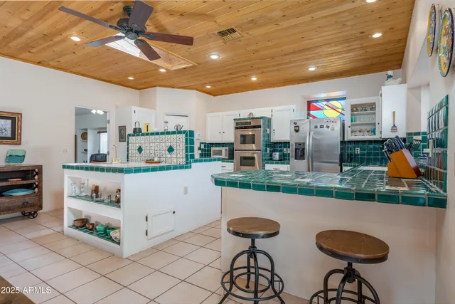 a view of balcony with furniture