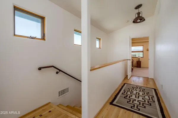 a view of balcony with furniture