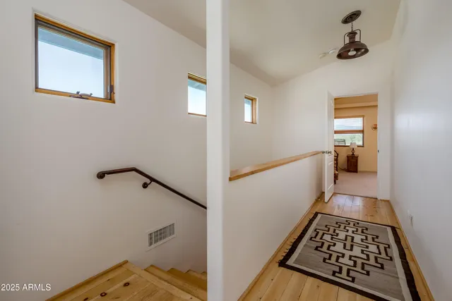 a view of balcony with furniture