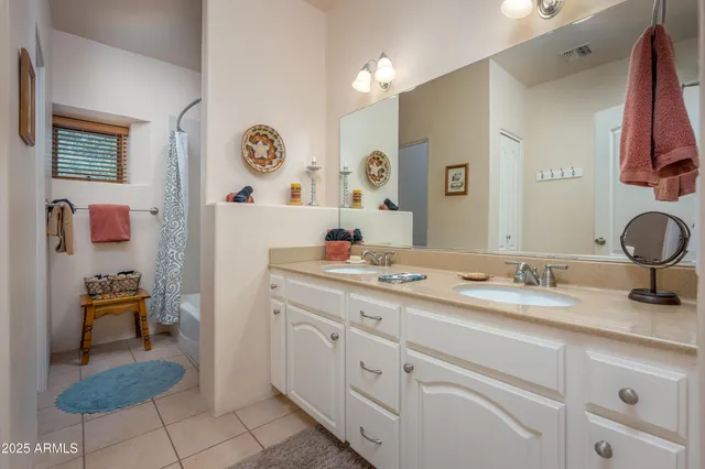 a view of a house with a yard and garage