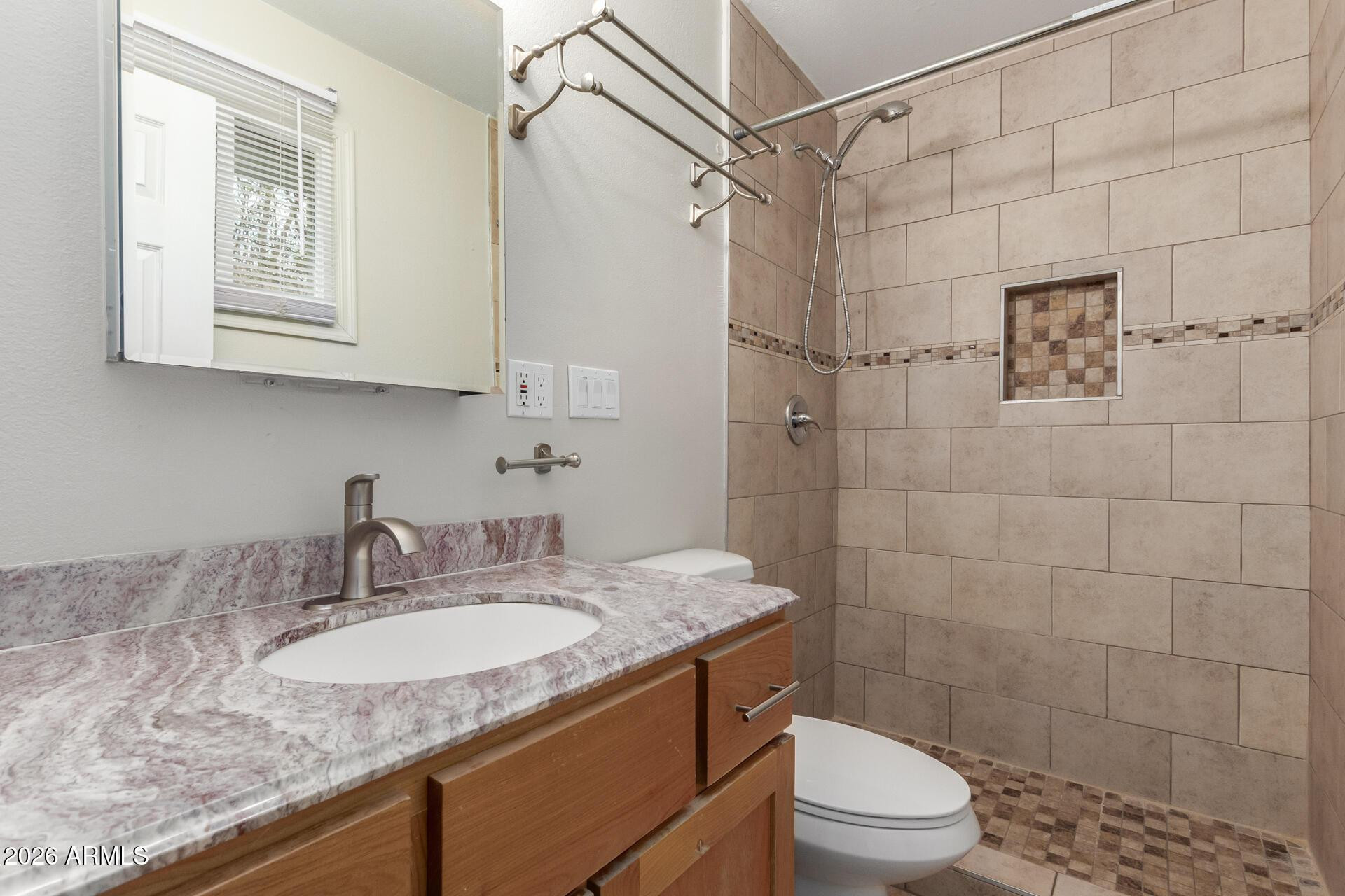 1628 East Del Rio Drive Tempe, AZ 85282 - Photo 23 of 32 a bathroom with a granite countertop sink toilet and shower
