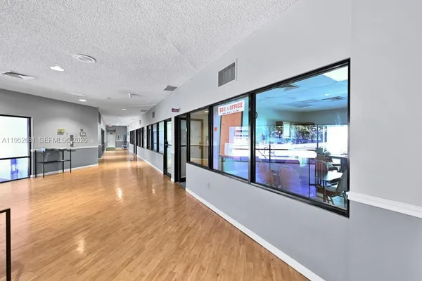 a view of a living room with kitchen island