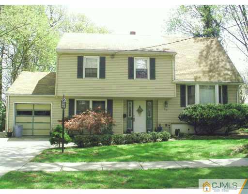 33 Meyer Road Edison, NJ 08817 - Photo 1 of 8 a view of a house with backyard and a garden