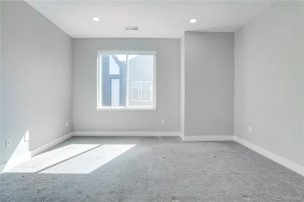 a view of an empty walk in closet