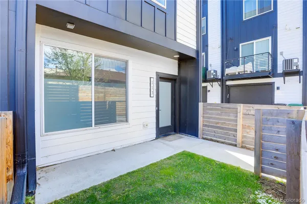 a kitchen with stainless steel appliances granite countertop a stove and a refrigerator