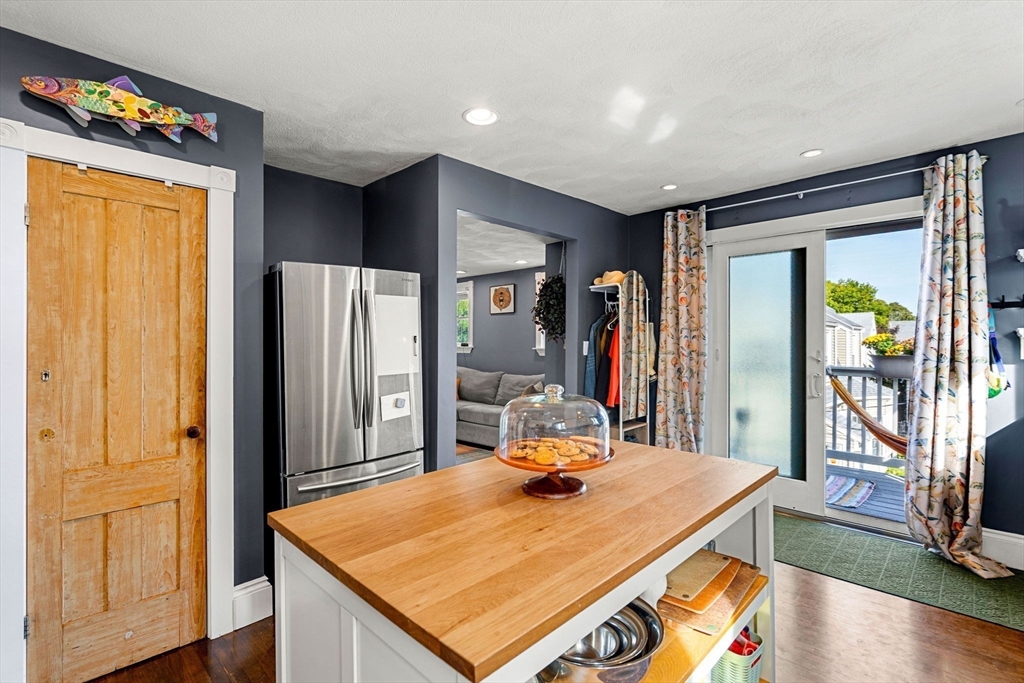 189 Burrill Street, Unit 2 Swampscott, MA 01907 - Photo 3 of 21 a room with pool table and a large mirror