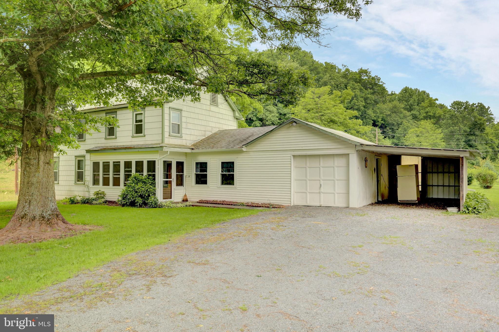 90 Milltown Road Landisburg, PA 17040 - Photo 3 of 32 front of house with 1 car garage/carport