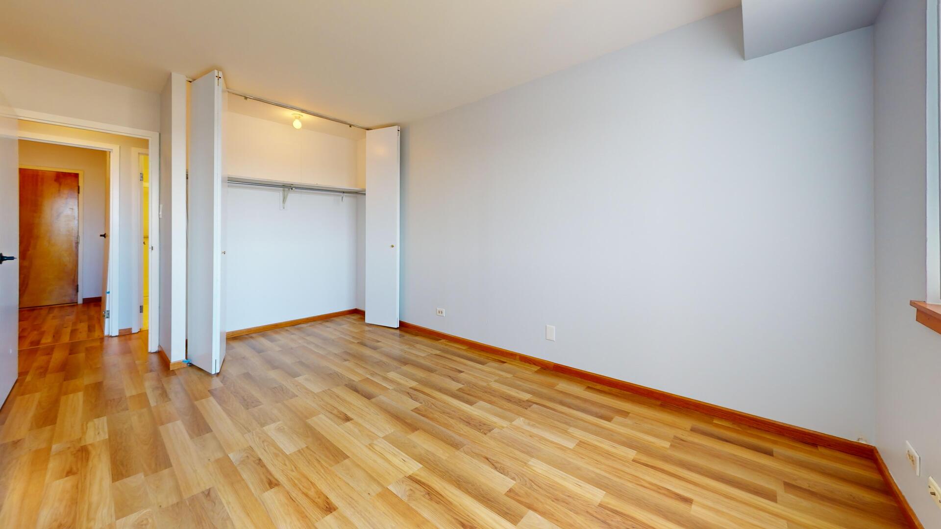 600 Naples Court, Unit 608 Glenview, IL 60025 - Photo 16 of 26 a view of empty room with wooden floor