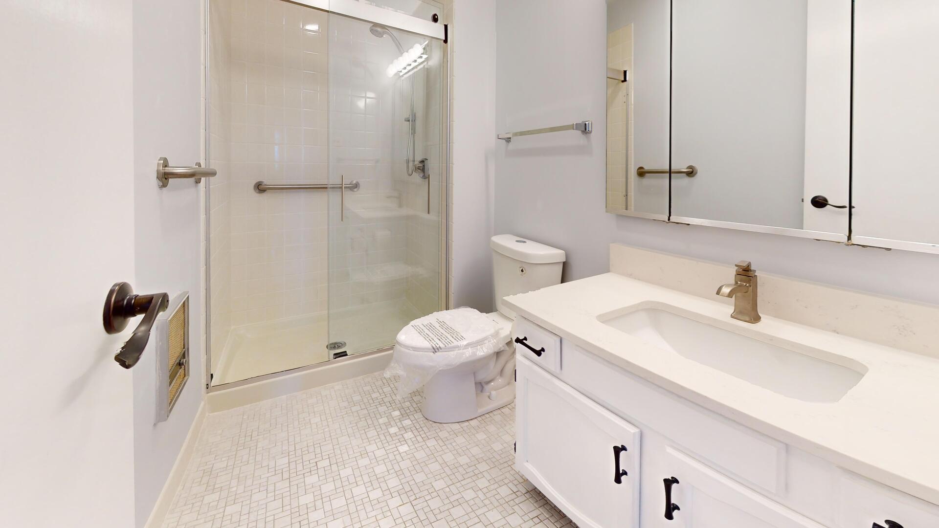 600 Naples Court, Unit 608 Glenview, IL 60025 - Photo 17 of 26 a bathroom with a sink toilet and shower