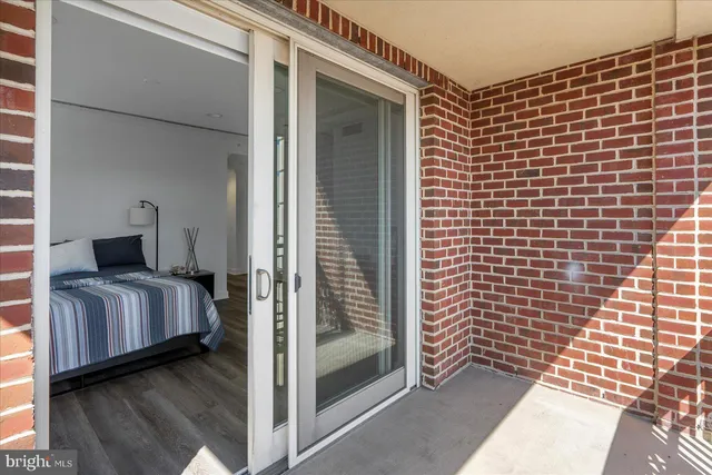 a view of a balcony with door